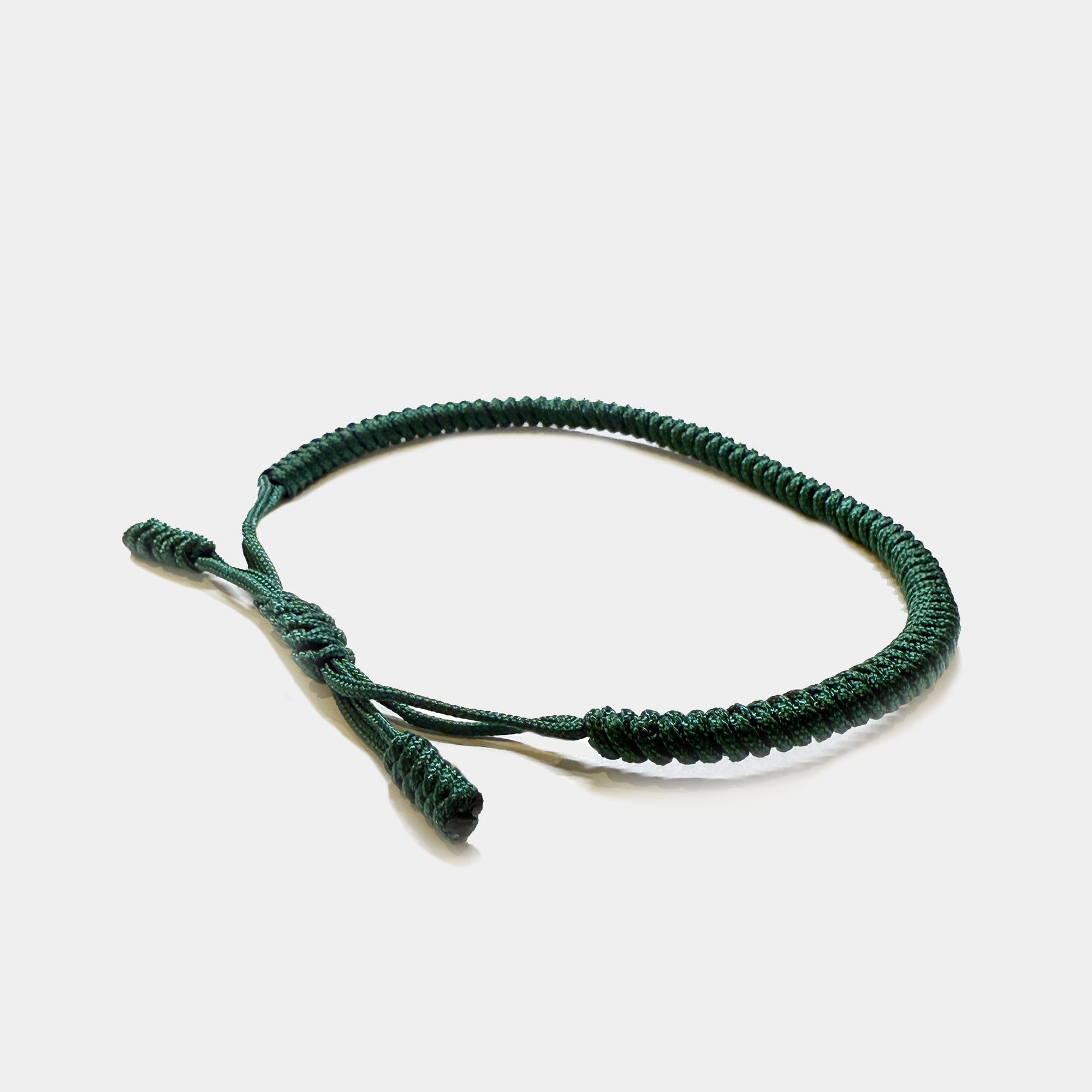 Grünes Knotenarmband